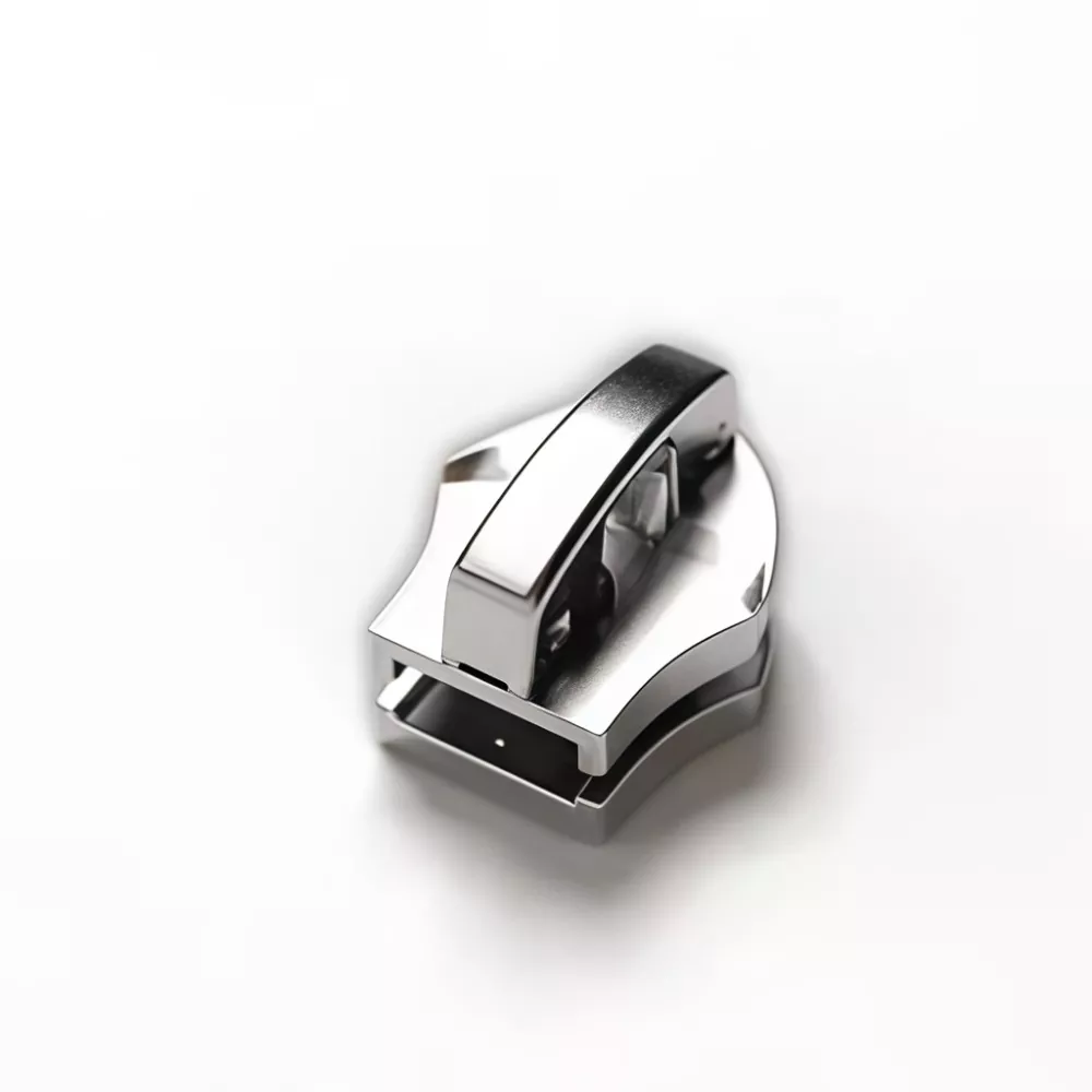 Automatikusan záródó csúszka fém cipzárhoz