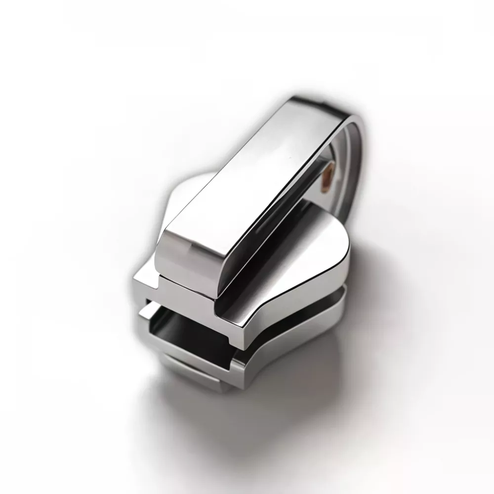 Megfordítható csúszka műanyag cipzárhoz